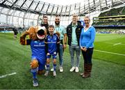 22 October 2022; Mascot Cormac de Búrca and his mother Michelle with Leo the Lion and Leinster players, from left, Jordan Larmour, Jamison Gibson-Park and Tommy O'Brien at the United Rugby Championship match between Leinster and Munster at Aviva Stadium in Dublin. Photo by Harry Murphy/Sportsfile