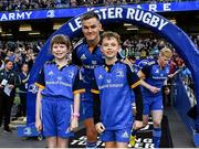 22 October 2022; Leinster captain Jonathan Sexton with matchday mascots Maria McCarthy and Cormac de Búrca at the United Rugby Championship match between Leinster and Munster at Aviva Stadium in Dublin. Photo by Harry Murphy/Sportsfile
