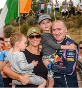 23 October 2022; Paul Nagle of Kerry with his wife Cathy and children Leon aged 3 and Fitz aged 5 at the final stage finish of his WRC career during day four of the FIA World Rally Championship RACC Catalunya in Spain. Photo by Philip Fitzpatrick/Sportsfile