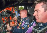 23 October 2022; Paul Nagle is interviewed by Molly Pettit of WRC TV during day four of the FIA World Rally Championship RACC Catalunya in Spain. Photo by Philip Fitzpatrick/Sportsfile