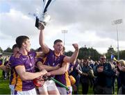 23 October 2022; Michael Roche of Kilmacud Crokes celebrates with the trophy and teammates after his side's victory in the Dublin County Senior Club Hurling Championship Final match between Kilmacud Crokes and Na Fianna at Parnell Park in Dublin. Photo by Dáire Brennan/Sportsfile