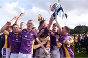 23 October 2022; Kilmacud Crokes players celebrates with the trophy after their side's victory in the Dublin County Senior Club Hurling Championship Final match between Kilmacud Crokes and Na Fianna at Parnell Park in Dublin. Photo by Dáire Brennan/Sportsfile