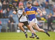 23 October 2022; Tadgh Gallagher of Kiladangan in action against Alan Morgan of Kilruane Mac Donaghs during the Tipperary County Senior Club Hurling Championship Final match between Kilruane MacDonaghs and Kiladangan at Semple Stadium in Thurles, Tipperary. Photo by Eóin Noonan/Sportsfile