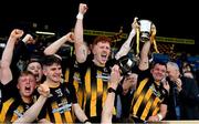 23 October 2022; Strokestown joint captains Diarmuid McGann, left, and David Neary lift the Fahey Cup after their side's victory in the Roscommon County Senior Club Football Championship Final match between Boyle and Strokestown at Dr Hyde Park in Roscommon. Photo by Seb Daly/Sportsfile