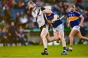 23 October 2022; Thomas Cleary of Kilruane Mac Donaghs is tackled by David Sweeney of Kiladangan during the Tipperary County Senior Club Hurling Championship Final match between Kilruane MacDonaghs and Kiladangan at Semple Stadium in Thurles, Tipperary. Photo by Eóin Noonan/Sportsfile