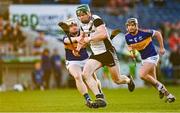 23 October 2022; Thomas Cleary of Kilruane Mac Donaghs is tackled by David Sweeney of Kiladangan during the Tipperary County Senior Club Hurling Championship Final match between Kilruane MacDonaghs and Kiladangan at Semple Stadium in Thurles, Tipperary. Photo by Eóin Noonan/Sportsfile