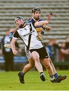 23 October 2022; Conor Austin of Kilruane Mac Donaghs in action against Tadgh Gallagher of Kiladangan during the Tipperary County Senior Club Hurling Championship Final match between Kilruane MacDonaghs and Kiladangan at Semple Stadium in Thurles, Tipperary. Photo by Eóin Noonan/Sportsfile