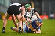 23 October 2022; James Quigley of Kiladangan in action against Cian Darcy of Kilruane Mac Donaghs during the Tipperary County Senior Club Hurling Championship Final match between Kilruane MacDonaghs and Kiladangan at Semple Stadium in Thurles, Tipperary. Photo by Eóin Noonan/Sportsfile