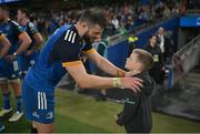 22 October 2022; Robbie Henshaw of Leinster with Luca Sexton, son of team-mate Jonathan Sexton, after the United Rugby Championship match between Leinster and Munster at Aviva Stadium in Dublin. Photo by Brendan Moran/Sportsfile