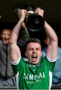 23 October 2022; Shane O'Neills captain Padraic Hillen lifts the trophy after the Armagh County Intermediate Club Football Championship Final match between Naomh Pól and Shane O'Neills at Athletic Grounds in Armagh. Photo by Ramsey Cardy/Sportsfile