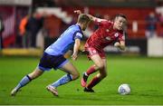 24 October 2022; Jack Moylan of Shelbourne in action against Mark Dignam of UCD during the SSE Airtricity League Premier Division match between Shelbourne and UCD at Tolka Park in Dublin. Photo by Tyler Miller/Sportsfile
