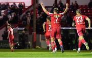 24 October 2022; Brian McManus of Shelbourne, centre, celebrates after team-mate Kameron Ledwidge, left, scores his side's first goal during the SSE Airtricity League Premier Division match between Shelbourne and UCD at Tolka Park in Dublin. Photo by Tyler Miller/Sportsfile