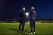 26 October 2022; Treaty United manager Tommy Barrett, left, and Waterford head coach Danny Searle in conversation before the SSE Airtricity League First Division play-off semi-final first leg match between Treaty United and Waterford at Markets Field in Limerick. Photo by Seb Daly/Sportsfile