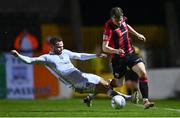 26 October 2022; Ben Lynch of Longford Town in action against Max Hemmings of Galway United during the SSE Airtricity League First Division play-off semi-final first leg match between Longford Town and Galway United at Bishopsgate in Longford. Photo by Ben McShane/Sportsfile