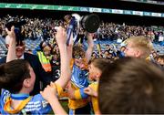27 October 2022; St Marys BNS captain Theo Duggan lifting the cup after beating Scoil Mhuire BNS during day one of the Allianz Cumann na mBunscoil Football Finals at Croke Park in Dublin. Photo by Eóin Noonan/Sportsfile