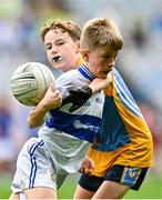 27 October 2022; Conor Chew of Scoil Mhuire BNS in action against Shane Horgan of St Mary's BNS during day one of the Allianz Cumann na mBunscoil Football Finals at Croke Park in Dublin. Photo by Eóin Noonan/Sportsfile