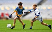 27 October 2022; Rossa Sweeney of St Mary's BNS in action against Senan Keenan of Scoil Mhuire BNS during day one of the Allianz Cumann na mBunscoil Football Finals at Croke Park in Dublin. Photo by Eóin Noonan/Sportsfile