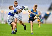 27 October 2022; Daniel Lehane of St Mary's BNS in action against Senan Keenan of Scoil Mhuire BNS during day one of the Allianz Cumann na mBunscoil Football Finals at Croke Park in Dublin. Photo by Eóin Noonan/Sportsfile