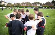 27 October 2022; Participants huddle during the Leinster Rugby Primary School Tag Blitz at Clontarf RFC in Dublin. Photo by Harry Murphy/Sportsfile