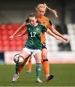 27 October 2022; Rhianna Breen of Northern Ireland in action against Grace Fitzpatrick Ryan of Republic of Ireland during the 2022/23 UEFA Women's U17 European Championship Qualifiers Round 1 match between Republic of Ireland and Northern Ireland at Seaview in Belfast. Photo by Ben McShane/Sportsfile