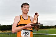 16 October 2022; John Shine of Leevale AC, Cork, pictured with the Jim McNamara Perpetual Trophy during the Autumn Open International Cross Country Festival at the Sport Ireland Campus in Dublin. Photo by Sam Barnes/Sportsfile
