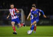 26 October 2022; Yassine En-Neyah of Waterford in action against Ben O’Riordan of Treaty United during the SSE Airtricity League First Division play-off semi-final first leg match between Treaty United and Waterford at Markets Field in Limerick. Photo by Seb Daly/Sportsfile