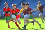 28 October 2022; Leon O'Hanlon of Sacred Heart NS in action against Ryan Kearon of St Patricks NS during day two of the Allianz Cumann na mBunscoil Football Finals at Croke Park in Dublin. Photo by Eóin Noonan/Sportsfile