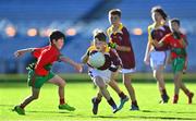 28 October 2022; Leon O'Hanlon of Sacred Heart NS in action against William Roe of St Patricks NS during day two of the Allianz Cumann na mBunscoil Football Finals at Croke Park in Dublin. Photo by Eóin Noonan/Sportsfile