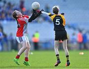 28 October 2022; Teaghan Fitzpatrick of Divine Word NS in action against Sarah Kavanagh of St Marnock's NS during day two of the Allianz Cumann na mBunscoil Football Finals at Croke Park in Dublin. Photo by Eóin Noonan/Sportsfile
