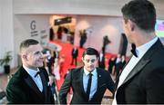 28 October 2022; Ciarán Kilkenny of Dublin, left, and Chrissy McKaigue of Derry, arrive for the PwC All-Stars Awards 2022 show at the Convention Centre in Dublin. Photo by Ramsey Cardy/Sportsfile