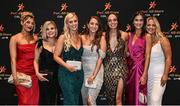 28 October 2022; Partners of Kerry players, from left, Orla O'Mahony, Emer McCarthy, Tara Casey, Molly O'Brien, Ciara Breathnach, Laura Daly, and Shauna O'Connor on arrival at the PwC All-Stars Awards 2022 at the Convention Centre in Dublin. Photo by David Fitzgerald/Sportsfile
