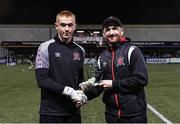 28 October 2022; Dundalk goalkeeper Nathan Shepperd is presented with his Player of the Year award by Dundalk head coach Stephen O'Donnell before the SSE Airtricity League Premier Division match between Dundalk and Bohemians at Casey's Field in Dundalk, Louth. Photo by Seb Daly/Sportsfile