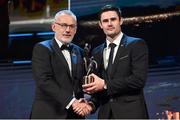 28 October 2022; Chrissy McKaigue of Derry is presented with his PwC All-Star award by Uachtarán Chumann Lúthchleas Gael Larry McCarthy during the PwC All-Stars Awards 2022 show at the Convention Centre in Dublin. Photo by Ramsey Cardy/Sportsfile