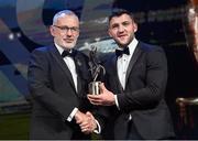 28 October 2022; Damien Comer of Galway is presented with his PwC All-Star award by Uachtarán Chumann Lúthchleas Gael Larry McCarthy during the PwC All-Stars Awards 2022 show at the Convention Centre in Dublin. Photo by Ramsey Cardy/Sportsfile
