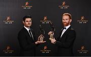 28 October 2022; Derry footballers Chrissy McKaigue, left, and Conor Glass with their PwC All-Star awards at the PwC All-Stars Awards 2022 at the Convention Centre in Dublin. Photo by Sam Barnes/Sportsfile