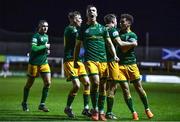 28 October 2022; UCD players, including Thomas Lonergan, centre, celebrate after their side's first goal, scored by Mark Dignam, during the SSE Airtricity League Premier Division match between Finn Harps and UCD at Finn Park in Ballybofey, Donegal. Photo by Ben McShane/Sportsfile