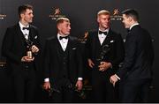 28 October 2022; Kilkenny hurlers, from left, Huw Lawlor, Mikey Butler, Adrian Mullen and TJ Reid with their PwC All-Star awards at the PwC All-Stars Awards 2022 at the Convention Centre in Dublin.  Photo by Sam Barnes/Sportsfile