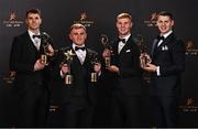 28 October 2022; Kilkenny hurlers, from left, Huw Lawlor, Mikey Butler, Adrian Mullen and TJ Reid with their PwC All-Star awards at the PwC All-Stars Awards 2022 at the Convention Centre in Dublin.  Photo by Sam Barnes/Sportsfile