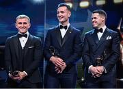 28 October 2022; Hurlers, from left, Mikey Butler of Kilkenny, Kyle Hayes of Limerick and TJ Reid of Kilkenny during the PwC All-Stars Awards 2022 show at the Convention Centre in Dublin. Photo by Ramsey Cardy/Sportsfile