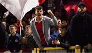28 October 2022; Shelbourne supporters celebrate after their side's victory after the SSE Airtricity League Premier Division match between Shelbourne and Drogheda United at Tolka Park in Dublin. Photo by Tyler Miller/Sportsfile