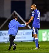 28 October 2022; Ethan Boyle of Finn Harps with a supporter after the SSE Airtricity League Premier Division match between Finn Harps and UCD at Finn Park in Ballybofey, Donegal. Photo by Ben McShane/Sportsfile