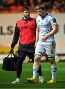 28 October 2022; Martin Moloney of Leinster leaves the field with Leinster rehabilitation physiotherapist Fearghal Kerin during the United Rugby Championship match between Scarlets and Leinster at Parc Y Scarlets in Llanelli, Wales. Photo by Harry Murphy/Sportsfile