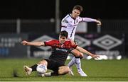 28 October 2022; James Clarke of Bohemians in action against Alfie Lewis of Dundalk during the SSE Airtricity League Premier Division match between Dundalk and Bohemians at Casey's Field in Dundalk, Louth. Photo by Seb Daly/Sportsfile
