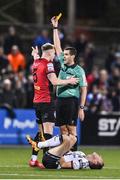 28 October 2022; Referee Adriano Reale shows a yellow card Ciarán Kelly of Bohemians during the SSE Airtricity League Premier Division match between Dundalk and Bohemians at Casey's Field in Dundalk, Louth. Photo by Seb Daly/Sportsfile