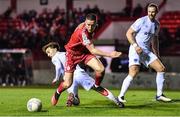 28 October 2022; Jack Moylan of Shelbourne in action against Darragh Markey of Drogheda United during the SSE Airtricity League Premier Division match between Shelbourne and Drogheda United at Tolka Park in Dublin. Photo by Tyler Miller/Sportsfile