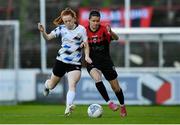 29 October 2022; Kira Bates-Crosbie of Bohemians in action against Kate Slevin of Athlone Town during the SSE Airtricity Women's National League match between Bohemians and Athlone Town at Dalymount Park in Dublin. Photo by Tyler Miller/Sportsfile