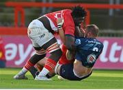 29 October 2022; Edwin Edogbo of Munster attempts to seperate Duane Vermeulen of Ulster and Diarmuid Barron of Munster during the United Rugby Championship match between Munster and Ulster at Thomond Park in Limerick. Photo by Brendan Moran/Sportsfile