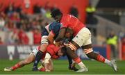 29 October 2022; Duane Vermeulen of Ulster tussles with Diarmuid Barron and Edwin Edogbo of Munster during the United Rugby Championship match between Munster and Ulster at Thomond Park in Limerick. Photo by Harry Murphy/Sportsfile