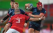 29 October 2022; Tom Stewart of Ulster is tackled by John Ryan of Munster during the United Rugby Championship match between Munster and Ulster at Thomond Park in Limerick. Photo by Brendan Moran/Sportsfile