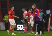 29 October 2022; Keith Earls of Munster, acting as water carrier, gives instructions to Paddy Patterson of Munster during the United Rugby Championship match between Munster and Ulster at Thomond Park in Limerick. Photo by Harry Murphy/Sportsfile
